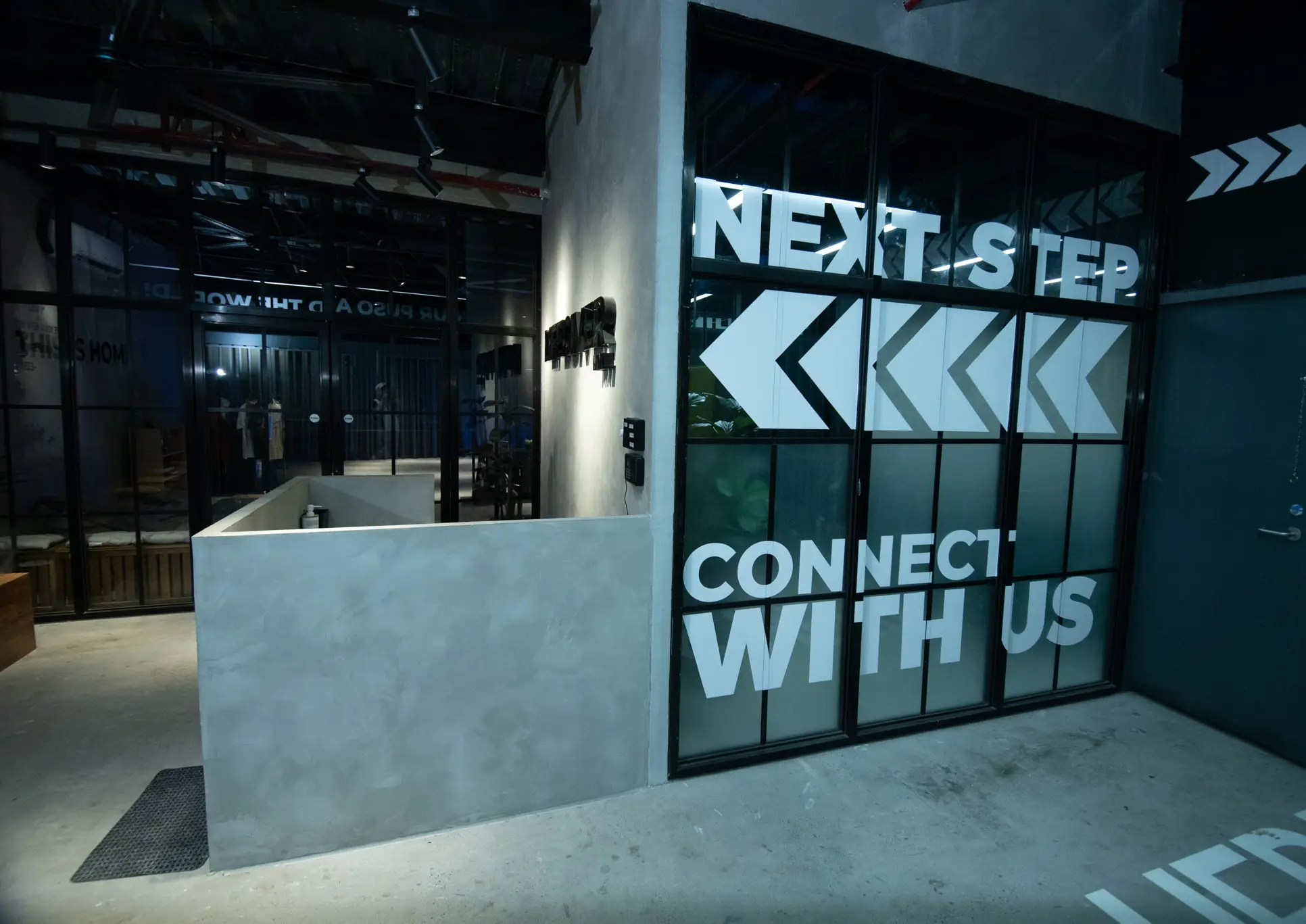 The “Next Step — Connect With Us” sign at the church entrance